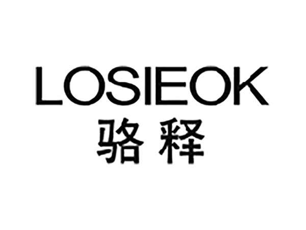 骆释